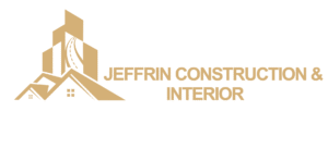 Jeffrin Construction & Interior horizontal logo with gold-colored building, rooftops and road graphic