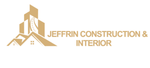 Jeffrin Construction & Interior horizontal logo with gold-colored building, rooftops and road graphic